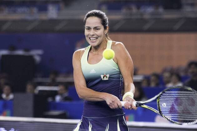 NEW DELHI, INDIA - DECEMBER 10: Ana Ivanovic of (Obi UAE Royals) in action against Kurumi Nara (Legendary Japan warriors) during the Coca Cola International Premier Tennis League at IG stadium, on December 10, 2015 in New Delhi, India. Legendary Japan Warriors won their first match of the International Premier Tennis League (IPTL) with a 24-21 margin against OBI UAE Royals. (Photo by Virendra Singh Gosain Hindustan Times ) Coca Cola International Premier Tennis League