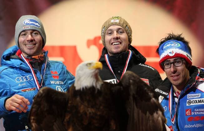 ALPINE SKIING - FIS WC Val D Isere VAL D ISERE,FRANCE,12.DEC.15 - ALPINE SKIING - FIS World Cup, giant slalom, men, award ceremony. Image shows Felix Neureuther (GER), Marcel Hirscher (AUT) and Victor Muffat-Jeandet (FRA) and an eagle. GEPAxpictures xAndreasxPranter