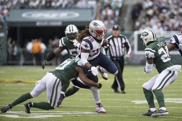 December 27, 2015, New England Patriots running back Brandon Bolden (38) runs with the ball as New York Jets free safety Marcus Gilchrist (21) tries to bring him down during the NFL American Football Herren USA game between the New England Patriots and the New York Jets at MetLife Stadium in East Rutherford, New Jersey. NFL 2015: Patriots vs Jets DEC 27 - ZUMAc04_