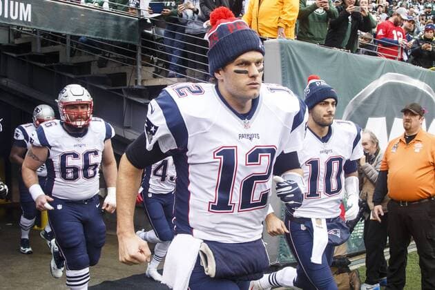 December 27, 2015, New England Patriots quarterback Tom Brady (12) heads out with quarterback Jimmy Garoppolo (10) and center Bryan Stork (66) prior to the NFL American Football Herren USA game between the New England Patriots and the New York Jets at MetLife Stadium in East Rutherford, New Jersey. NFL 2015: Patriots vs Jets DEC 27 - ZUMAc04_