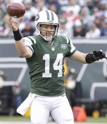 New York Jets quarterback Ryan Fitzpatrick throws a pass in the first half against the New England Patriots at MetLife Stadium in East Rutherford, New Jersey on December 27, 2015.  NYP20151227102 JOHNxANGELILLO