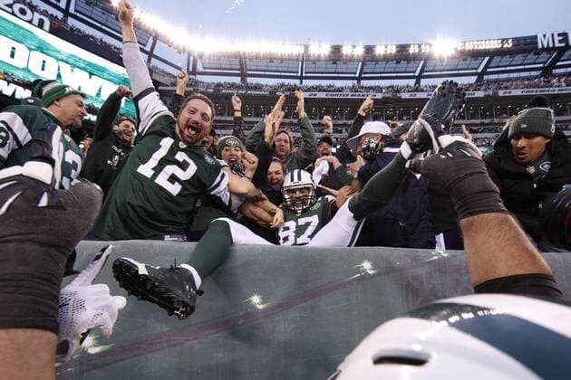 December 27, 2015, New York Jets wide receiver Eric Decker (87) celebrates his overtime touchdown catch in the stands during the NFL American Football Herren USA game between the New England Patriots and the New York Jets at MetLife Stadium in East Rutherford, New Jersey. The New York Jets won 26-20. NFL 2015: Patriots vs Jets DEC 27 - ZUMAc04_