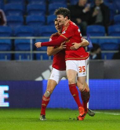 29.12.2015. Cardiff City Stadium, Cardiff, Wales. Skybet Championship. Cardiff versus Nottingham Forest. Nottingham Forest s Oliver Burke celebrates with a teammate after scoring the first goal of the game xPaulxJenkinsx  ActionPlus11692495