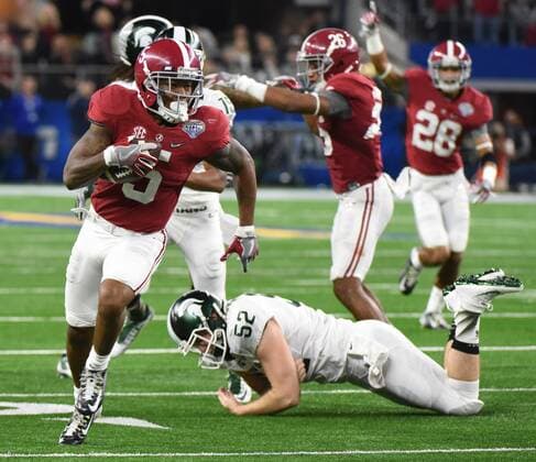 The Alabama Crimson Tide s Cyrus Jones returns a punt for a touchdown against the Michigan State Spartans in the College Football Playoff Semifinal at the Goodyear Cotton Bowl Classic at AT&T Stadium on December 31, 2015 in Arlington, Texas. The Tide won 38-0 and will face Clemson in the National Championship on January 11, 2016.  DAL20151231116 IanxHalperin