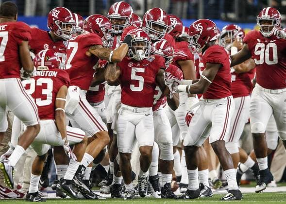 December 31, 2015: Alabama Crimson Tide players congratulate defensive back Cyrus Jones (5) after intercepting a pass during the Goodyear Cotton Bowl Classic - College Football Playoff Semifinal game between Michigan State Spartans and the Alabama Crimson Tide at AT&T Stadium in Arlington, TX. The Crimson Tide defeated the Spartans 38-0 NCAA College League USA Football 2015: Goodyear Cotton Bowl Classic Michigan State vs. Alabama DEC 31 - ZUMAc04_