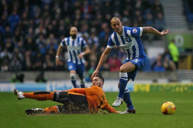 Football - 2015 2016 The Championship - Brighton and Hove Albion vs.Wolverhampton Wanderers Brighton s Bobby Zamora skips round the challenge of Matt Doherty of Wolverhampton Wanderers at the Amex Stadium Brighton Colorsport Shaun Boggust 