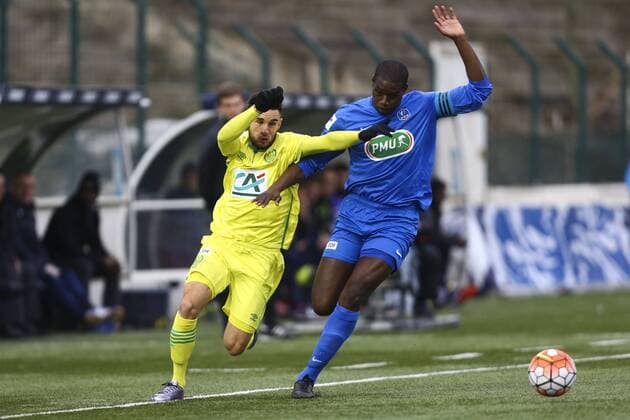 Adrien Thomasson (Nantes) vs Diarra Wounde (Le Blanc Mesnil) FOOTBALL : Le Blanc Mesnil vs FC Nantes Ligapokal Frankreich - Coupe de la Ligue - 02 01 2016 - GwendolineLeGoffx 
