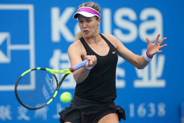 SHENZHEN, CHINA - JANUARY 07: (CHINA OUT) Eugenie Bouchard of Canada returns a shot against Timea Babos of Hungary in quarter finals match during Day five of 2016 WTA Tennis Damen Shenzhen Open at Longgang Sports Center on January 7, 2016 in Shenzhen, Guangdong Province of China.  CFP477886439 