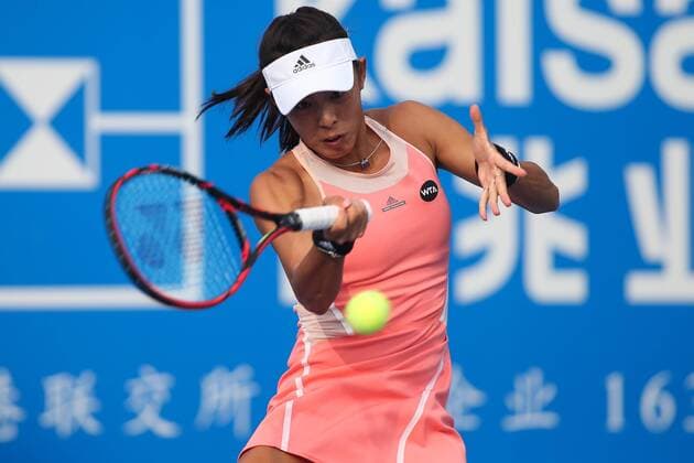 SHENZHEN, CHINA - JANUARY 07: (CHINA OUT) Wang Qiang of China returns a shot against Agnieszka Radwanska of Poland in quarter finals match during Day five of 2016 WTA Tennis Damen Shenzhen Open at Longgang Sports Center on January 7, 2016 in Shenzhen, Guangdong Province of China.  CFP477886456 