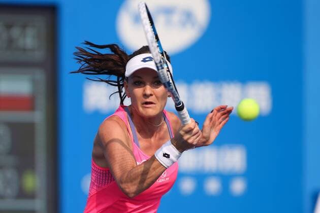 SHENZHEN, CHINA - JANUARY 08: (CHINA OUT) Agnieszka Radwanska of Poland returns a shot against Anna-Lena Friedsam of Germany in Women s semi-final match during Day six of 2016 WTA Tennis Damen Shenzhen Open at Longgang Sports Center on January 8, 2016 in Shenzhen, Guangdong Province of China.  CFP477921501 