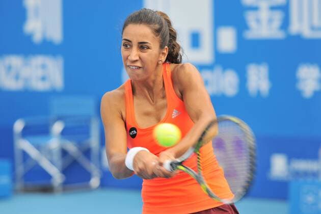 SHENZHEN, CHINA - JANUARY 08: (CHINA OUT) Cagla Buyukakcay of Turkey returns a shot with Alexandra Krunic of Serbia against Xu Yifan and Zheng Saisai of China in Women s doubles semi-final match during Day six of 2016 WTA Tennis Damen Shenzhen Open at Longgang Sports Center on January 8, 2016 in Shenzhen, Guangdong Province of China.  CFP477926680 