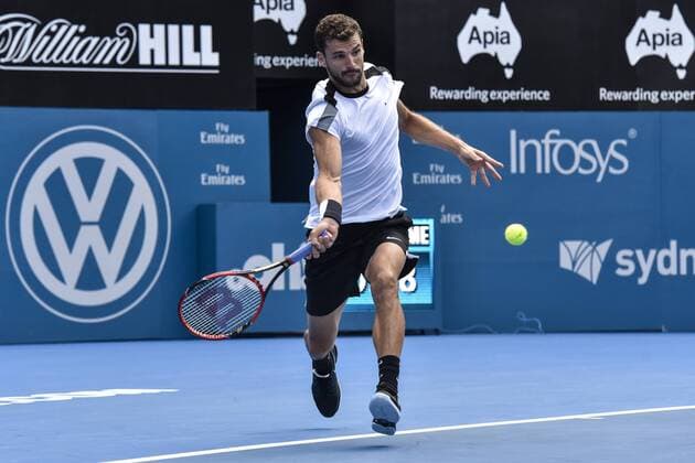15.01.16 Sydney, Australia. Grigot Dimitrov (BUL) in action against Gilles Muller (LUX) during their mens singles semi final match on day 6 at the Apia International Sydney. Dimitrov won the match 6-2,7-6. xNigelxOwenx  ActionPlus11696980