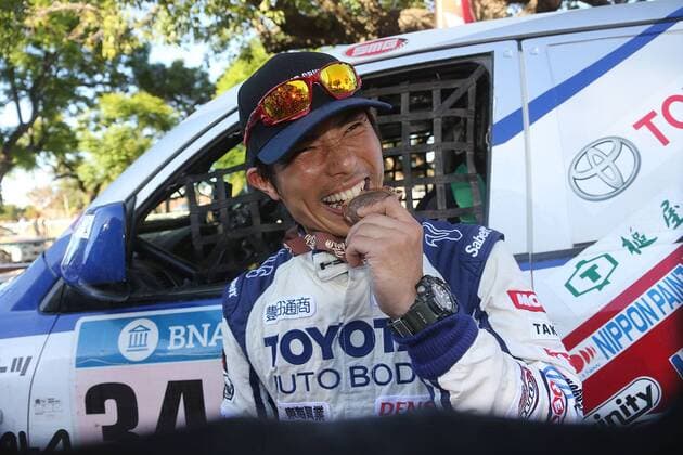 - ROSARIO, ARGENTINA: Japanese driver Akira and his Toyota Landcruiser, looks happy at the end of the final stage of the 2016 Dakar Rally Race from Villa Carlos Paz to Rosario, Argentina, on Saturday 16 January 2016. The 2016 Dakar Rally takes place from 03 till 16 January 2014 in Argentina and Bolivia. WILLYxWEYENS  x04775533x