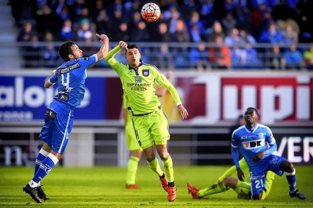 - GENT, BELGIUM: Gent s Rafinha Rafael Scapini de Almeida and Anderlecht s Matias Suarez fight for the ball during the Jupiler Pro League match between KAA Gent and RSC Anderlecht, in Gent, Sunday 17 January 2016, on day 22 of the Belgian soccer championship. YORICKxJANSENS x04775850x