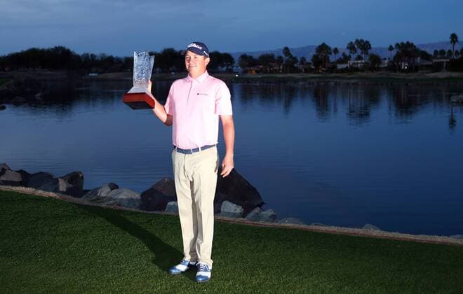 January 24, 2016 Jason Dufner poses with the trophy after winning the CareerBuilder Challenge In Partnership With The Clinton Foundation on the second playoff hole on the 18th green at the TPC Stadium course at PGA Golf Herren West in La Quinta, California.. PGA 2016: CareerBuilder Challenge JAN 24 - ZUMAcb8_