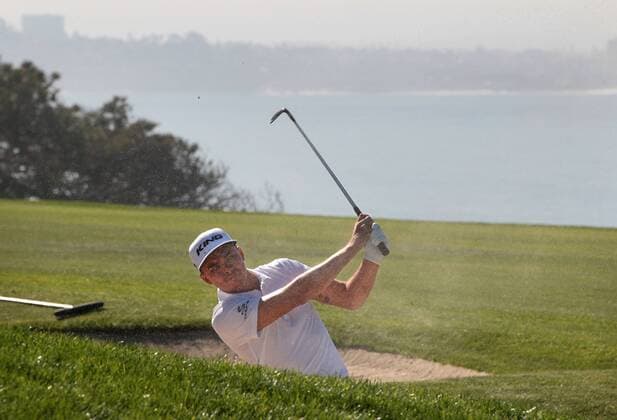 Jan. 29, 2016 - San Diego, California, United States - January 29, 2016, San Diego, California, USA_ Farmers Insurance Open Day 2- Rickie Fowler shots from a 4th. fairway sand trap on the South Course. _Mandatory Photo Credit: Photo by Golf 2016 - Farmers Insurance Open - Day 2 - ZUMAs44_