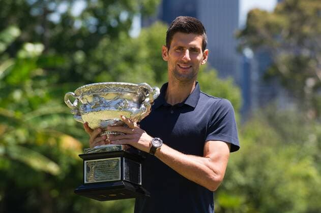 Novak Djokovic of Serbia poses for photos with the Norman Brookes Challenge Cup at the Government House in Melbourne, Australia, Feb. 1, 2016. Novak Djokovic of Serbia won his men s singles final match against Andy Murray of Britain during the Australian Open Tennis Championships on Sunday. ) (SP)AUSTRALIA-MELBOURNE-TENNIS-AUSTRALIAN OPEN-MEN S SINGLES-CHAMPION BaixXue 