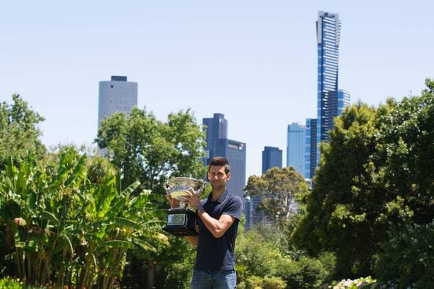 Novak Djokovic of Serbia poses for photos with the Norman Brookes Challenge Cup at the Government House in Melbourne, Australia, Feb. 1, 2016. Novak Djokovic of Serbia won his men s singles final match against Andy Murray of Britain during the Australian Open Tennis Championships on Sunday. ) (SP)AUSTRALIA-MELBOURNE-TENNIS-AUSTRALIAN OPEN-MEN S SINGLES-CHAMPION BaixXue 