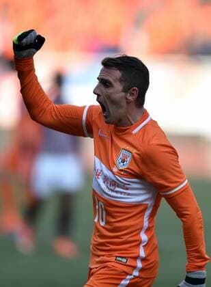 Fußball, AFC Champions League, Shandong Luneng FC - Mohun Bagan (160202) -- JINAN, Feb. 2, 2016 -- Montillo of China s Shandong Luneng FC celebrates for goal during the preliminary round match against India s Mohun Bagan at the 2016 AFC Champions League in Jinan, capital of east China s Shandong Province, on Feb. 2, 2016. China s Shandong Luneng FC won 6-0. ) (lm) (SP)CHINA-JINAN-AFC 2016-PRE (CN) ZhuxZheng 
