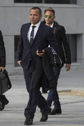 FC Barcelona Barca s player Neymar Jr. arrives with his father Neymar Santos (L) to the national court to testify in an investigation into alleged irregularities regarding his transfer to Barcelona, in Madrid, Spain. February 02, 2016.  (20160202009)