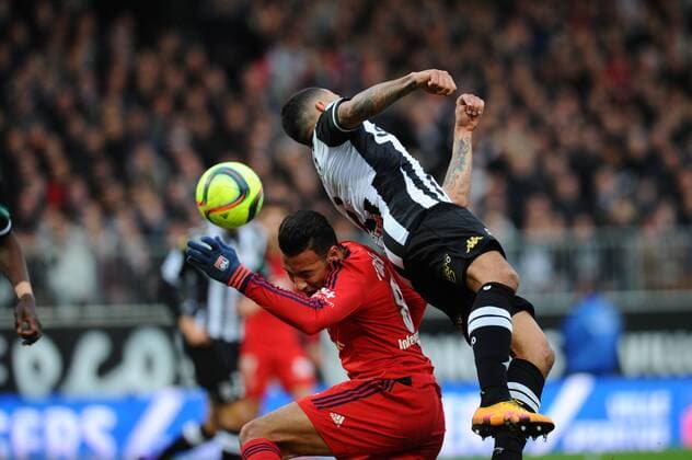 Gael ANGOULA (sco) - Corentin TOLISSO (ol) FOOTBALL : SCO Angers vs Olympique Lyon - Ligue 1 - 06 02 2016 LECOEUR FEP Panoramic 
