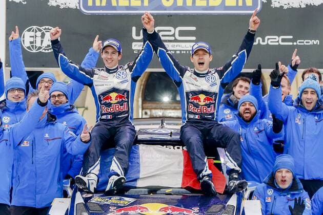 Motorsport, WRC, Rallye Schweden, Siegerehrung 160214 Sebastien Ogier med kartläsare Julien Ingrassia, Volkswagen Motorsport, Volkswagen Polo WRC Motorsport Rallye WM jublar vid prisutdelningen under Rally Sweden den 14 februari 2016 i Karlstad.  Copyright: ANNA-LENAxBERGQVIST BB160214BB464