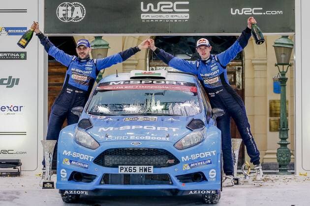 Motorsport, WRC, Rallye Schweden, Siegerehrung 160214 Elfyn Evans med kartläsare Craig Parry, M World Rally Team, Ford Fiesta R5 jublar vid prisutdelningen under Rally Sweden den 14 februari 2016 i Karlstad.  Copyright: ANNA-LENAxBERGQVIST BB160214BB489