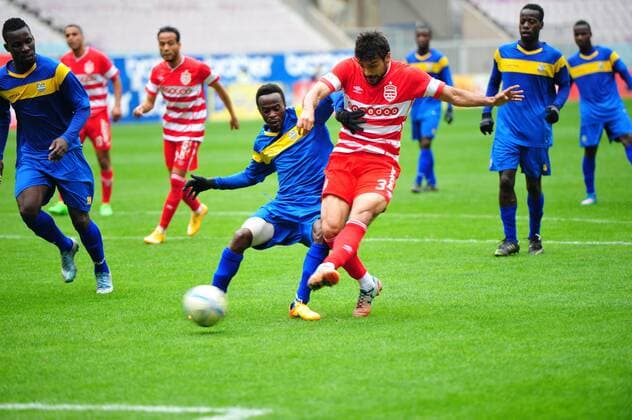 Oussama Haddadi (R)of African Club and Salifu Latif AS Tanda during the first round match of the league of the African champions clubs between Club African and Ivorian club team AS Tanda to the stadium of Rades. The Champions League: Club Africain vs AS Tanda (2-0). 