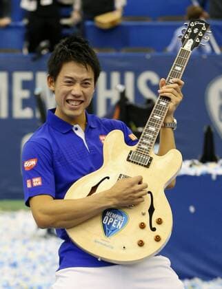 Nishikori wins Memphis Open title Japan s Kei Nishikori holds his guitar trophy after winning the Memphis Open tennis tournament title in Memphis, Tennessee on Feb. 14, 2016, by beating Taylor Fritz of the United States 6-4, 6-4. 