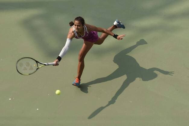 NEW DELHI, INDIA - FEBRUARY 17: Indian tennis player Ankita Raina in action against Russian tennis player Marina Melnikova during Delhi Open 2016 tournament at DLTA Complex (Delhi Lawn Tennis Association) on February 17, 2016 in New Delhi, India. (Photo by Vipin Kumar Hindustan Times ) Delhi Open 2016 Tournament