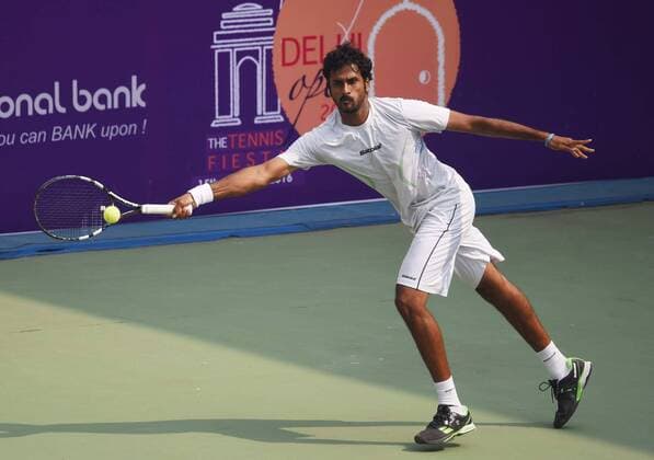 NEW DELHI, INDIA - FEBRUARY 17: Indian tennis player Saketh Myneni in action against Australian Professional tennis player Matthew Barton during Delhi Open 2016 tournament at DLTA Complex (Delhi Lawn Tennis Association) on February 17, 2016 in New Delhi, India. (Photo by Vipin Kumar Hindustan Times ) Delhi Open 2016 Tournament