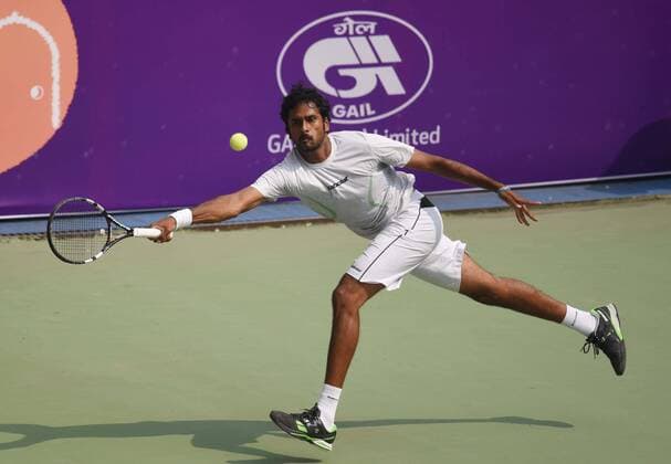 NEW DELHI, INDIA - FEBRUARY 17: Indian tennis player Saketh Myneni in action against Australian Professional tennis player Matthew Barton during Delhi Open 2016 tournament at DLTA Complex (Delhi Lawn Tennis Association) on February 17, 2016 in New Delhi, India. (Photo by Vipin Kumar Hindustan Times ) Delhi Open 2016 Tournament