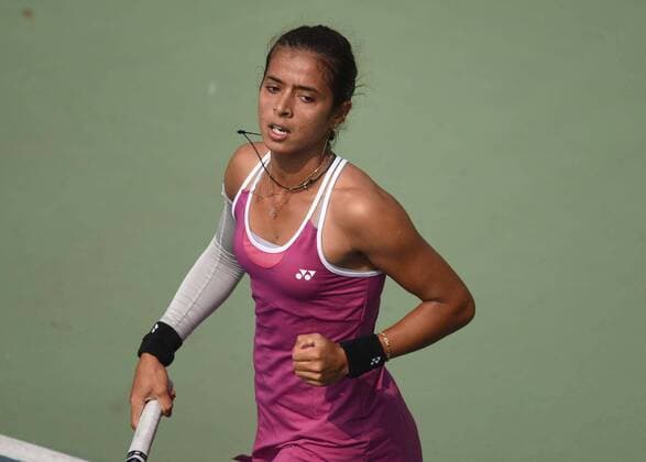 NEW DELHI, INDIA - FEBRUARY 17: Indian tennis player Ankita Raina in action against Russian tennis player Marina Melnikova during Delhi Open 2016 tournament at DLTA Complex (Delhi Lawn Tennis Association) on February 17, 2016 in New Delhi, India. (Photo by Vipin Kumar Hindustan Times ) Delhi Open 2016 Tournament