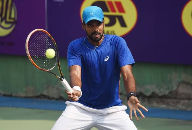 NEW DELHI, INDIA - FEBRUARY 17: Indian tennis player Vishnu Vardhan in action against Chinese tennis player Zhe Li during Delhi Open 2016 tournament at DLTA Complex (Delhi Lawn Tennis Association) on February 17, 2016 in New Delhi, India. (Photo by Vipin Kumar Hindustan Times ) Delhi Open 2016 Tournament