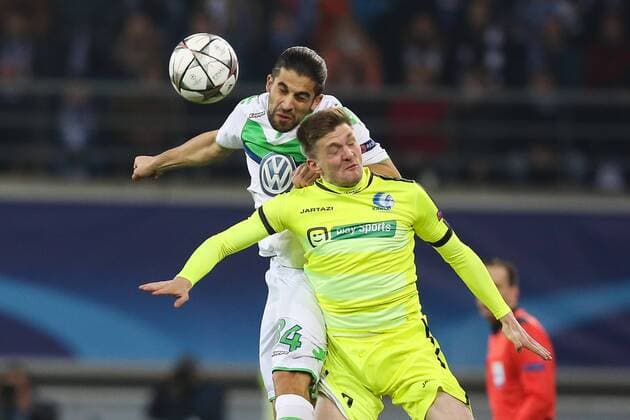 Wolfsburg s Ricardo Rodriguez and Gent s Thomas Foket fight for the ball during a game between Belgian KAA Gent and German VfL Wolfsburg, a first leg of the 1 8 finals of the UEFA Champions League competition, in Gent, Wednesday 17 February 2016. BRUNOxFAHY  x04794733x