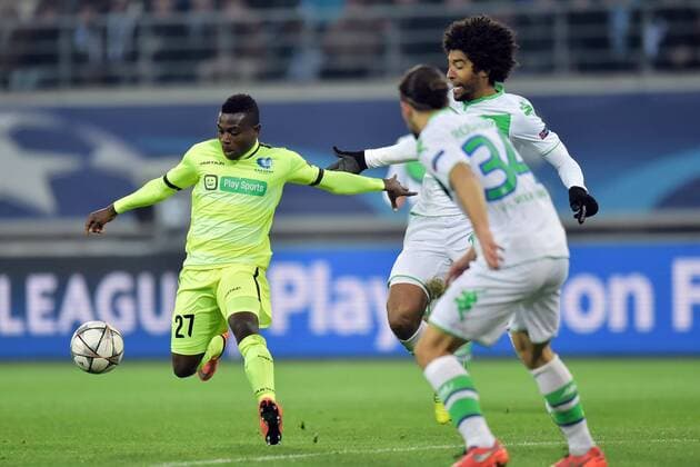 Simon Moses Daddy Ajala forward of KAA Gent in front of Dante defender of VfL Wolfsburg FOOTBALL : KAA Gent vs VFL Wolfsburg - Champions League 17 02 2016 PHOTONEWS PANORAMIC 