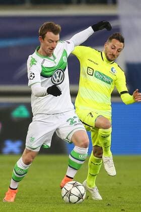 Wolfsburg s Maximilian Arnold and Gent s Danijel Milicevic fight for the ball during a game between Belgian KAA Gent and German VfL Wolfsburg, a first leg of the 1 8 finals of the UEFA Champions League competition, in Gent, Wednesday 17 February 2016. BRUNOxFAHY  x04794784x