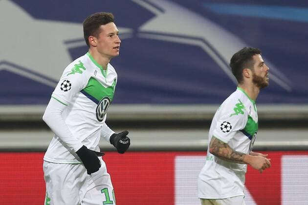 Wolfsburg s Julian Draxler celebrates after scoring during a game between Belgian KAA Gent and German VfL Wolfsburg, a first leg of the 1 8 finals of the UEFA Champions League competition, in Gent, Wednesday 17 February 2016. BRUNOxFAHY  x04794801x
