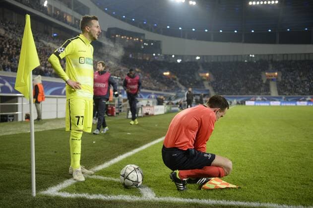 Gent s Danijel Milicevic and the assistant referee pictured during a game between Belgian KAA Gent and German VfL Wolfsburg, a first leg of the 1 8 finals of the UEFA Champions League competition, in Gent, Wednesday 17 February 2016. YORICKxJANSENS  x04794917x