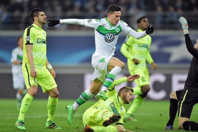Julian Draxler midfielder of VfL Wolfsburg jumps over Nielsen Lasse defender of KAA Gent but FOOTBALL : KAA Gent vs VFL Wolfsburg - Champions League 17 02 2016 PHOTONEWS PANORAMIC 