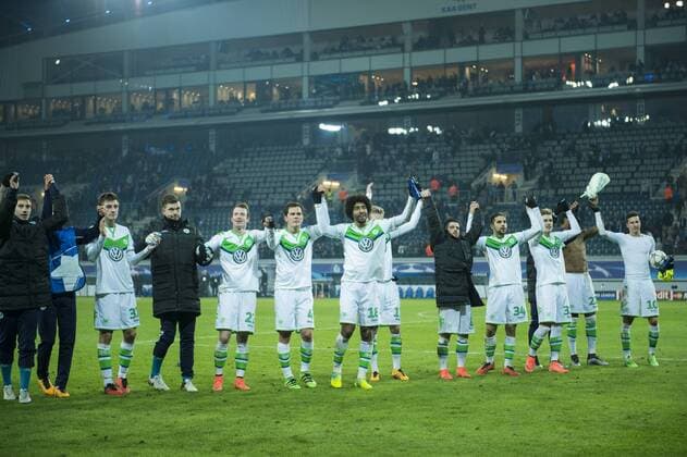 Wolfsburg s players celebrate after winning a game between Belgian KAA Gent and German VfL Wolfsburg, a first leg of the 1 8 finals of the UEFA Champions League competition, in Gent, Wednesday 17 February 2016. JASPERxJACOBS  x04794955x