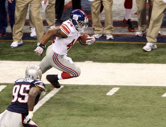 Feb. 5, 2012 - Indianapolis, IN, USA - New York Giants running back Ahmad Bradshaw 44 carries the ball during Super Bowl XLVI. Super Bowl XLVI came down to the final seconds as the New York Giants beat the New England Patriots with a final score of 21-17 in Lucas Oil Stadium in Indianapolis, IN. Photo By Aaron Suozzi Super Bowl XLVI New York Giants vs. New England Patriots - ZUMAs102