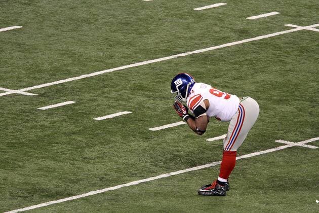 Feb. 5, 2012 - Indianapolis, IN, USA - New York Giants defensive end Justin Tuck 91 celebrates sacking New England Patriots quarterback Tom Brady 12 during Super Bowl XLVI. Super Bowl XLVI came down to the final seconds as the New York Giants beat the New England Patriots with a final score of 21-17 in Lucas Oil Stadium in Indianapolis, IN. Photo By Aaron Suozzi Super Bowl XLVI New York Giants vs. New England Patriots - ZUMAs102