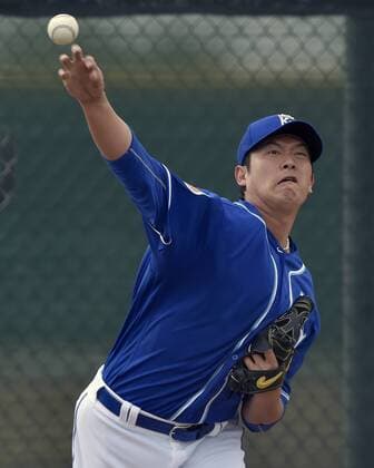 Feb. 19, 2016 - Surprise, AZ, USA - Kansas City Royals pitcher Chien-Ming Wang during a spring training workout on Friday, Feb. 19, 2016, in Surprise, Az. Kansas City Royals spring training - ZUMAm67_