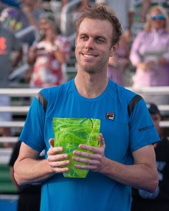 Feb. 21, 2016 - Delray Beach, Florida, US - Smiling SAM QUERREY holding his trophy after winning the singles final title over RAJEEV RAM 6-4, 7-6(6) at the ATP Tennis Herren World Tour Delray Beach Open in Delray Beach, Florida. ATP World Tour Delray Beach Open Singles Final - ZUMAd84_