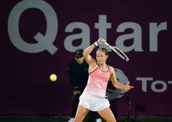 (160222) -- DOHA, Feb. 22, 2016 -- Daria Kasatkina of Russia hits a return to Wang Qiang of China during the women s singles first round match at WTA Tennis Damen Qatar Open 2016 in Doha, Qatar, Feb. 21, 2016. Kasatkina won 2-1. ) (SP)QATAR-DOHA-TENNIS-QATAR OPEN 2016-WOMEN S SINGLES Nikku 