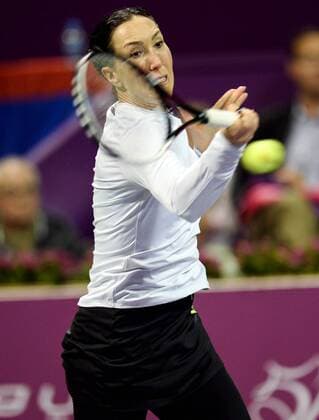 Jelena Jankovic of Serbia returns the ball during the women s singles match against Jana Cepelova of Slovakia at WTA Tennis Damen Qatar Open 2016 at the International Khalifa Tennis Complex of Doha, Qatar, Feb. 22, 2016. Jelena Jankovic won 2-1. ) (SP)QATAR-DOHA-TENNIS-QATAR OPEN 2016-WOMEN S SINGLES Nikku 