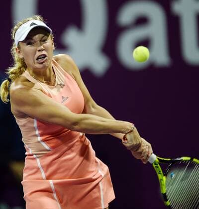 Caroline Wozniacki of Denmark returns the ball during the women s singles match against Konjuh of Croatia at WTA Tennis Damen Qatar Open 2016 at the International Khalifa Tennis Complex of Doha, Qatar, Feb. 22, 2016. Caroline Wozniacki won 2-1. ) (SP)QATAR-DOHA-TENNIS-QATAR OPEN 2016-WOMEN S SINGLES Nikku 