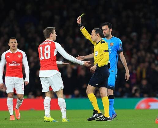 Fußball, Champions League, FC Arsenal - FC Barcelona Arsenal s Nacho Monreal gets booked UEFA Champions League 2nd Round First Leg - Arsenal vs Barcelona - Emirates Stadium -England - 23rd February 2016 - Picture David Klein Sportimage EDITORIAL USE ONLY. No use with unauthorised audio, video, data, fixture lists, club league logos or live services. Online in-match use limited to 120 images, no video emulation. No use in betting, games or single club league player publications.