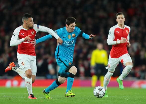 23.02.2016. Emirates Stadium, London, England. UEFA Champions League. Arsenal versus Barcelona. Arsenal Midfielder Francis Coquelin clashes with Barcelona Midfielder Lionel Messi during a tackle xMarkxKertonx  ActionPlus11710372